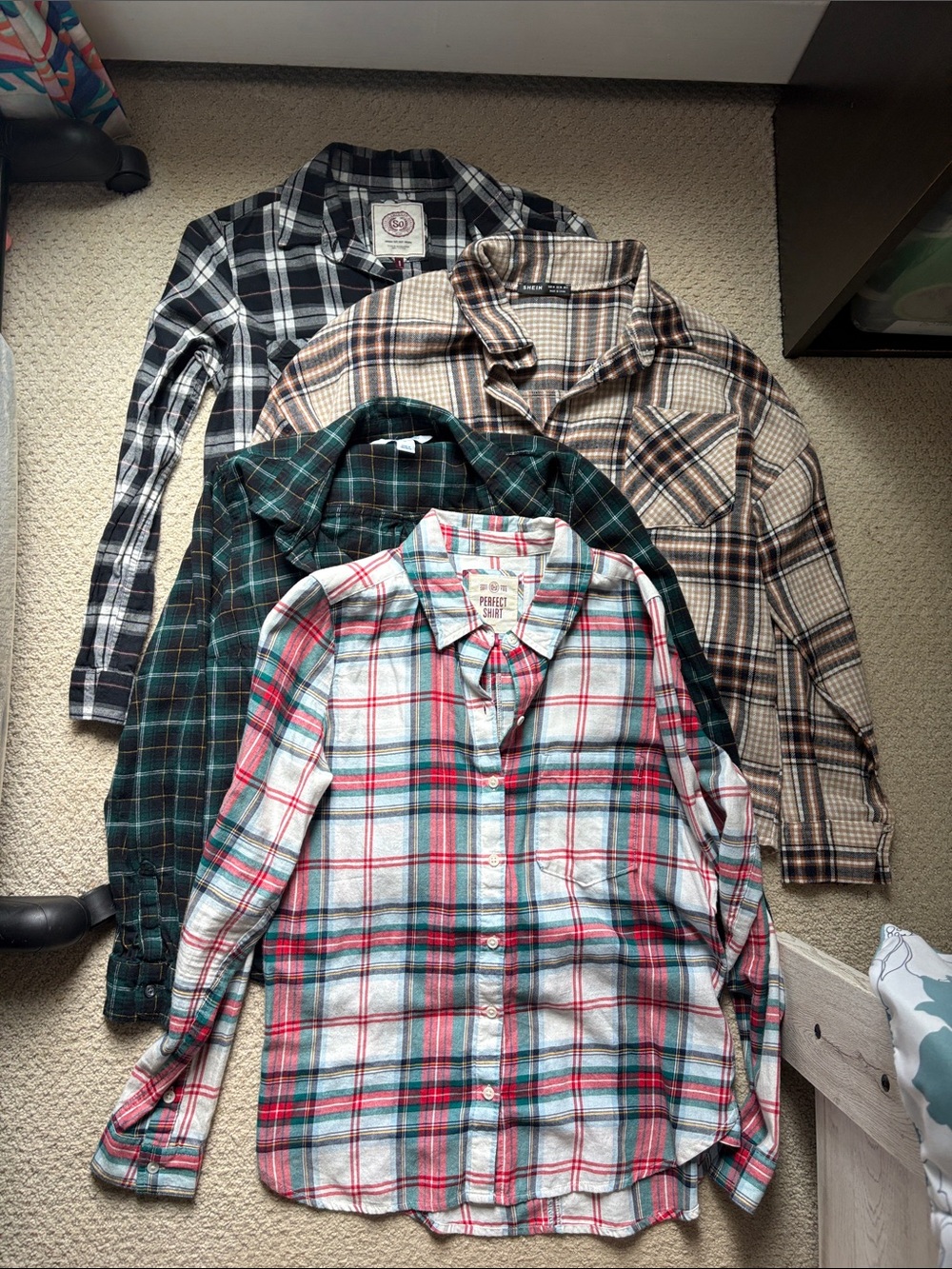 4 women’s flannel shirts